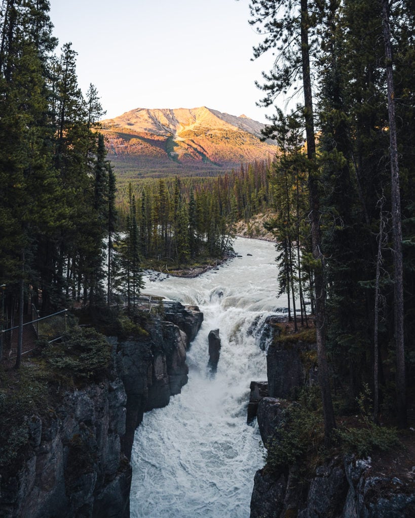 a photo of sunwapta falls in the canadian rockies at sunset best stops on the icefields parkway canada - icefields parkway stops