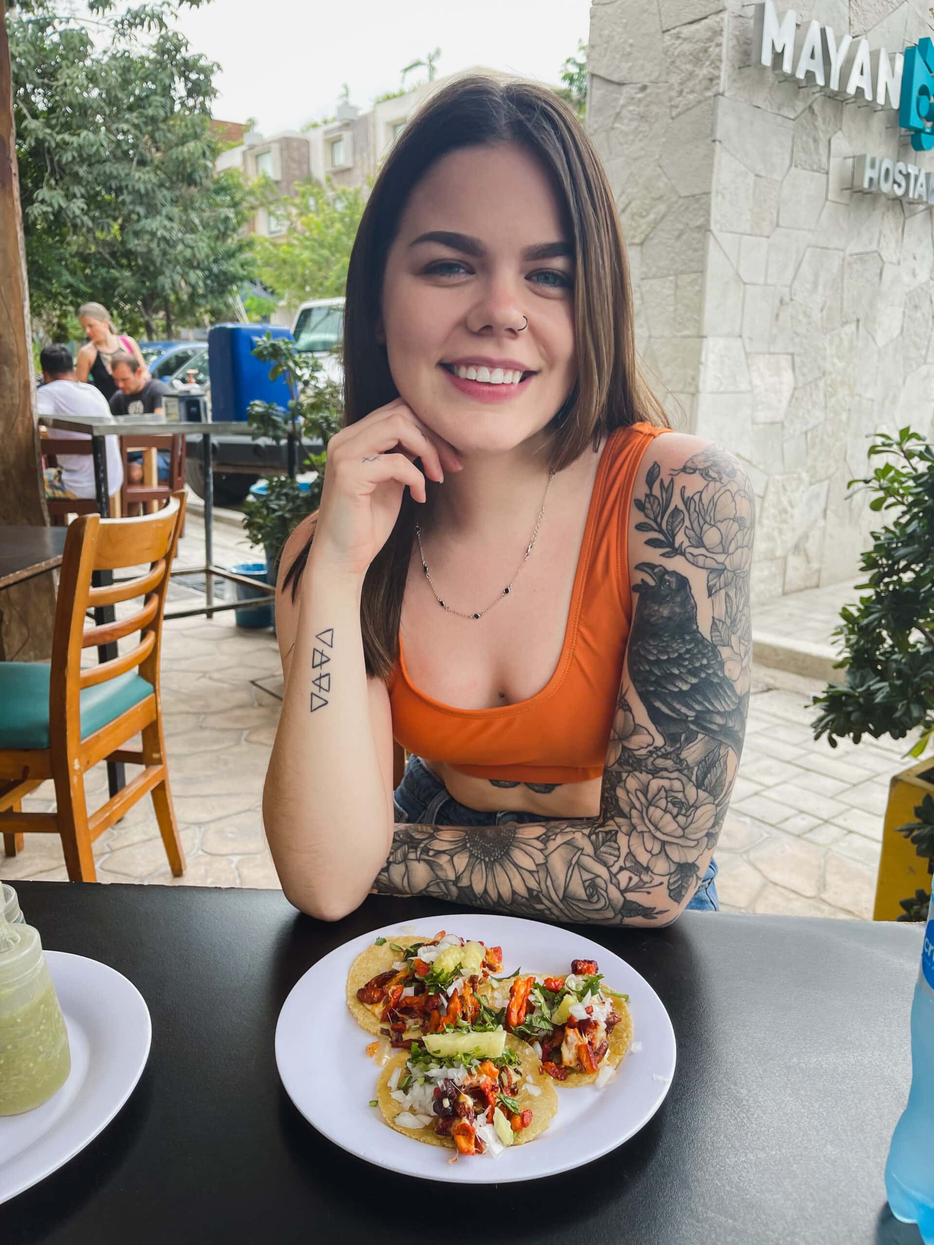 people are obsessed with travelling to try new food from different places - eating tacos in mexico