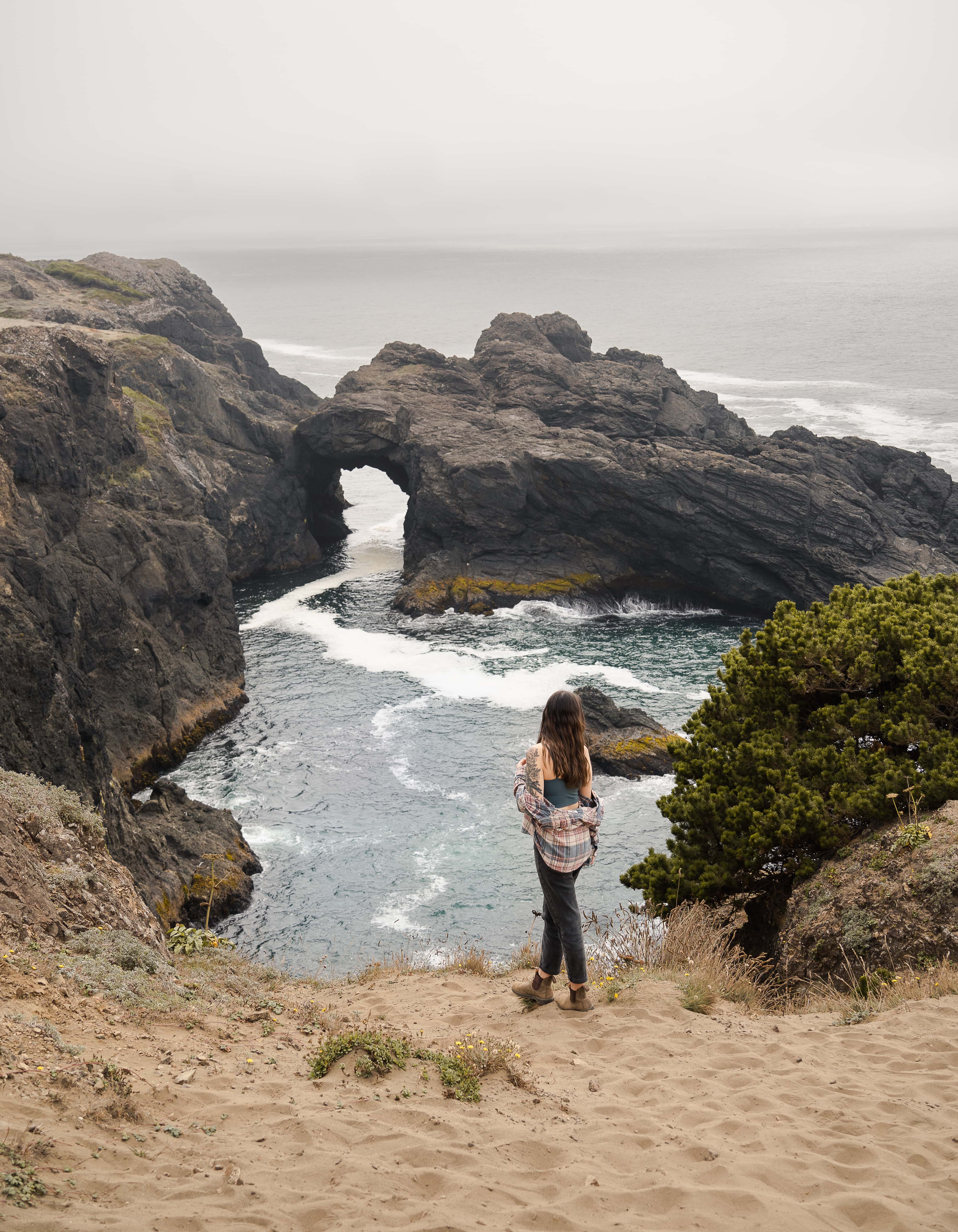 a beautiful viewpoint of coastal arches on the Indian Sands hiking trail - you have to add this to your itinerary to have the best oregon road trip ever