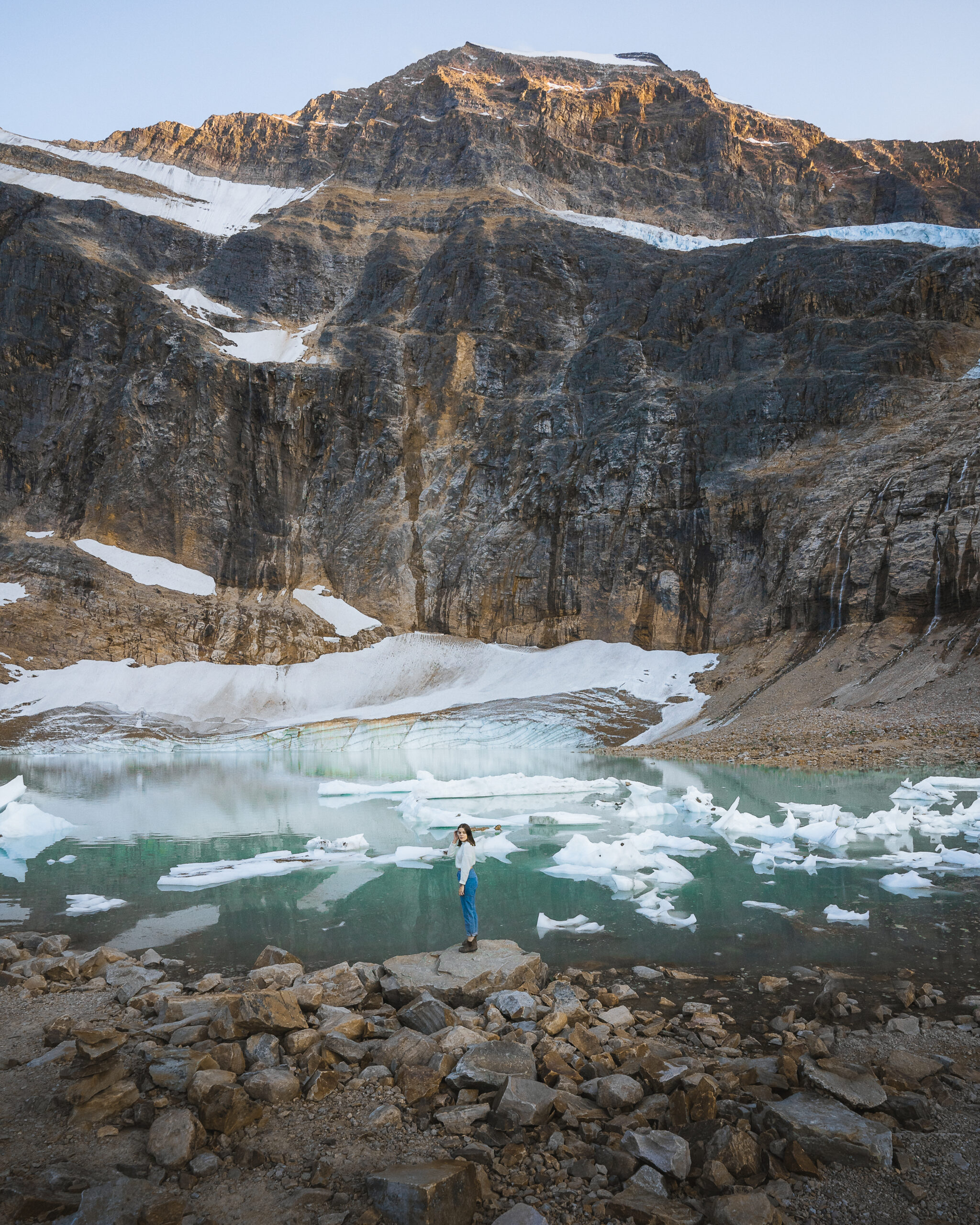 standing at the base of mount edith cavell by Cavell pond